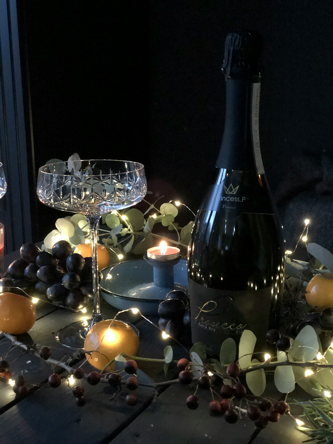 Elegant party with string lights and glasses of champagne
