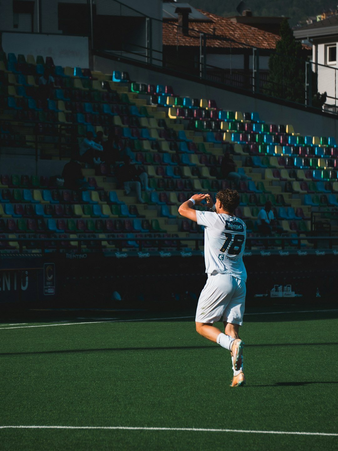 Football player celebrating a goal on the pitch