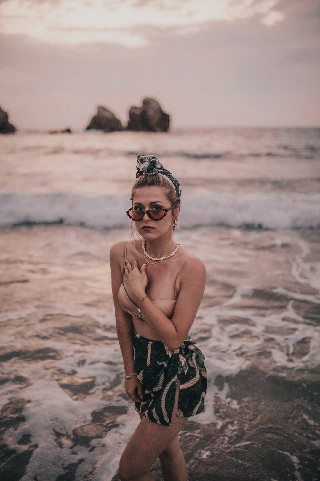 celebrity posing on beach