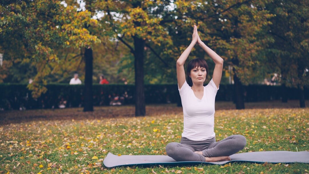 woman doing yoga outdoors